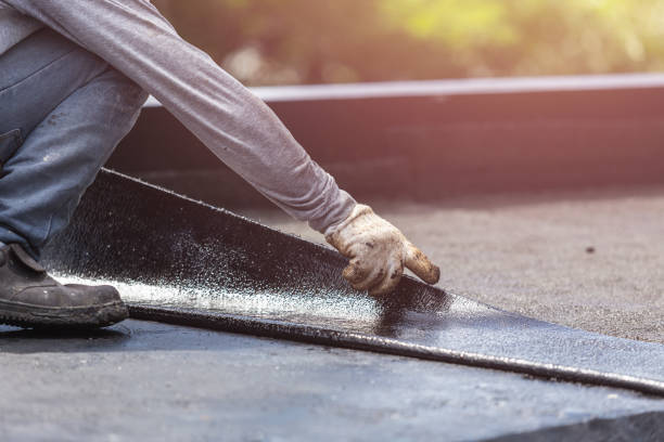 Professional Waterproofing technician working in Ixonia, WI